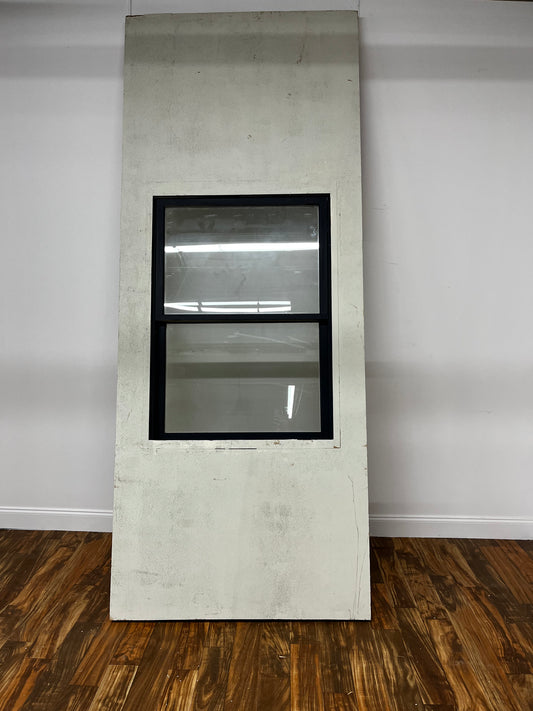 TEXTURED WALL WITH BLACK WINDOW
