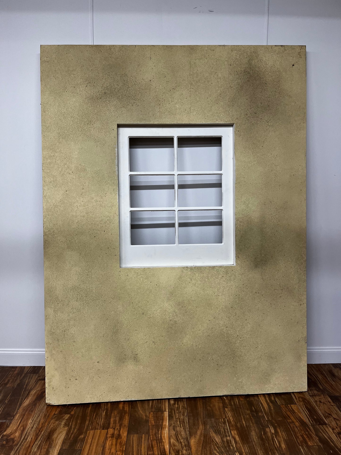 BEIGE TEXTURED EXTERIOR FLAT WITH WINDOW