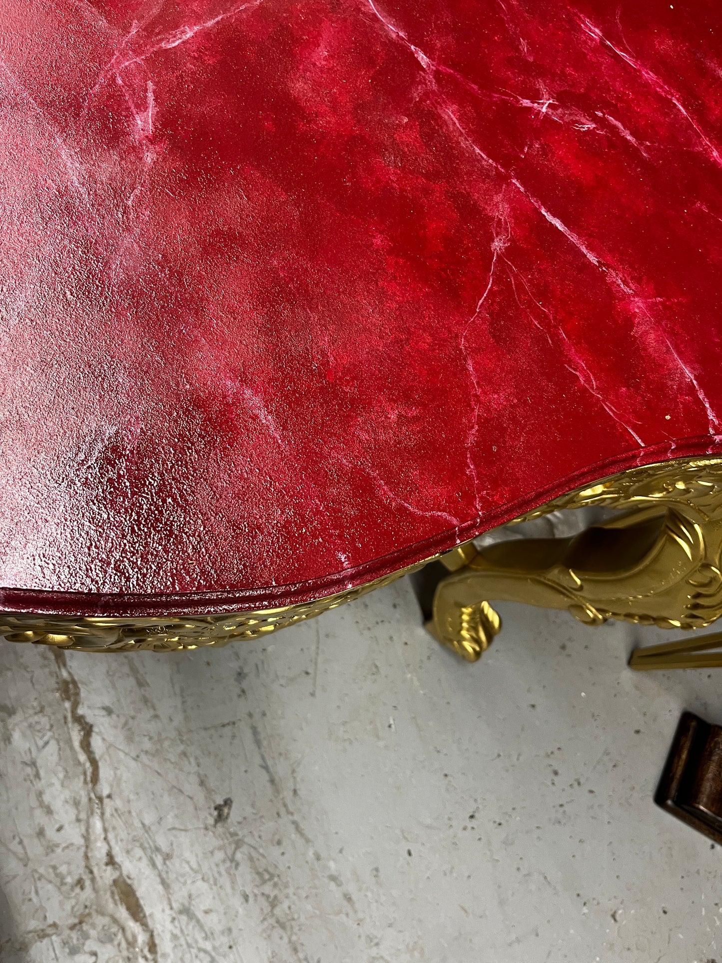 ORNATE RED AND GOLD FAUX MARBLE CONSOLE TABLE