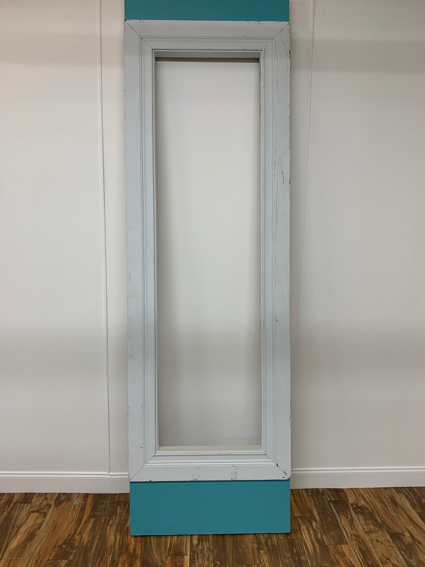 WHITE WINDOW FRAME WITH MOULDING