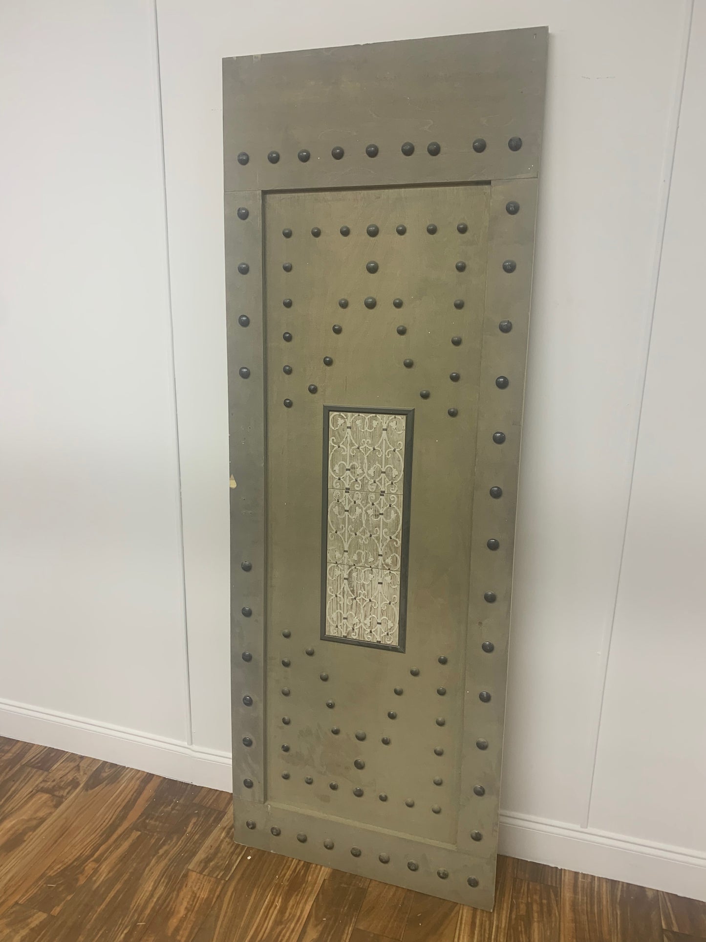 GRAY RIVET ACCENT DOOR WITH TILE INSERT